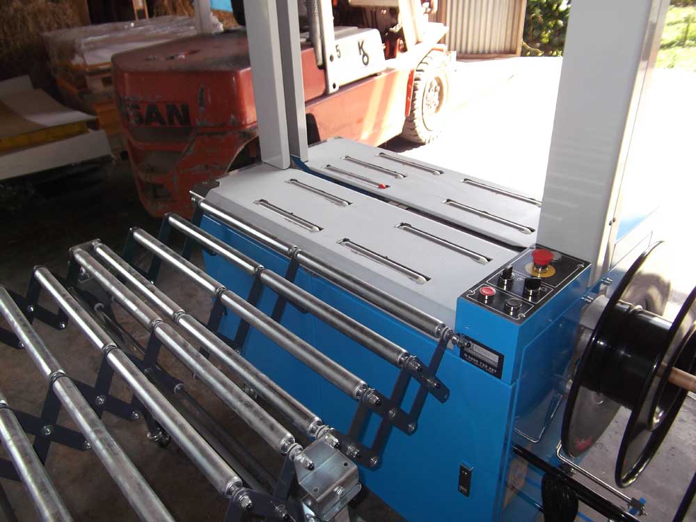 Conveyor to Semi Auto Strapping Machine